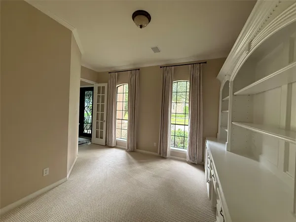 a view of livingroom with window and hardwood floor