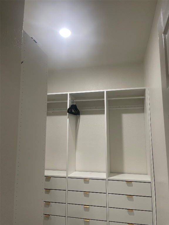 145 Merrick Road Georgetown, TX 78628 - Photo 27 of 33 a view of walk in closet