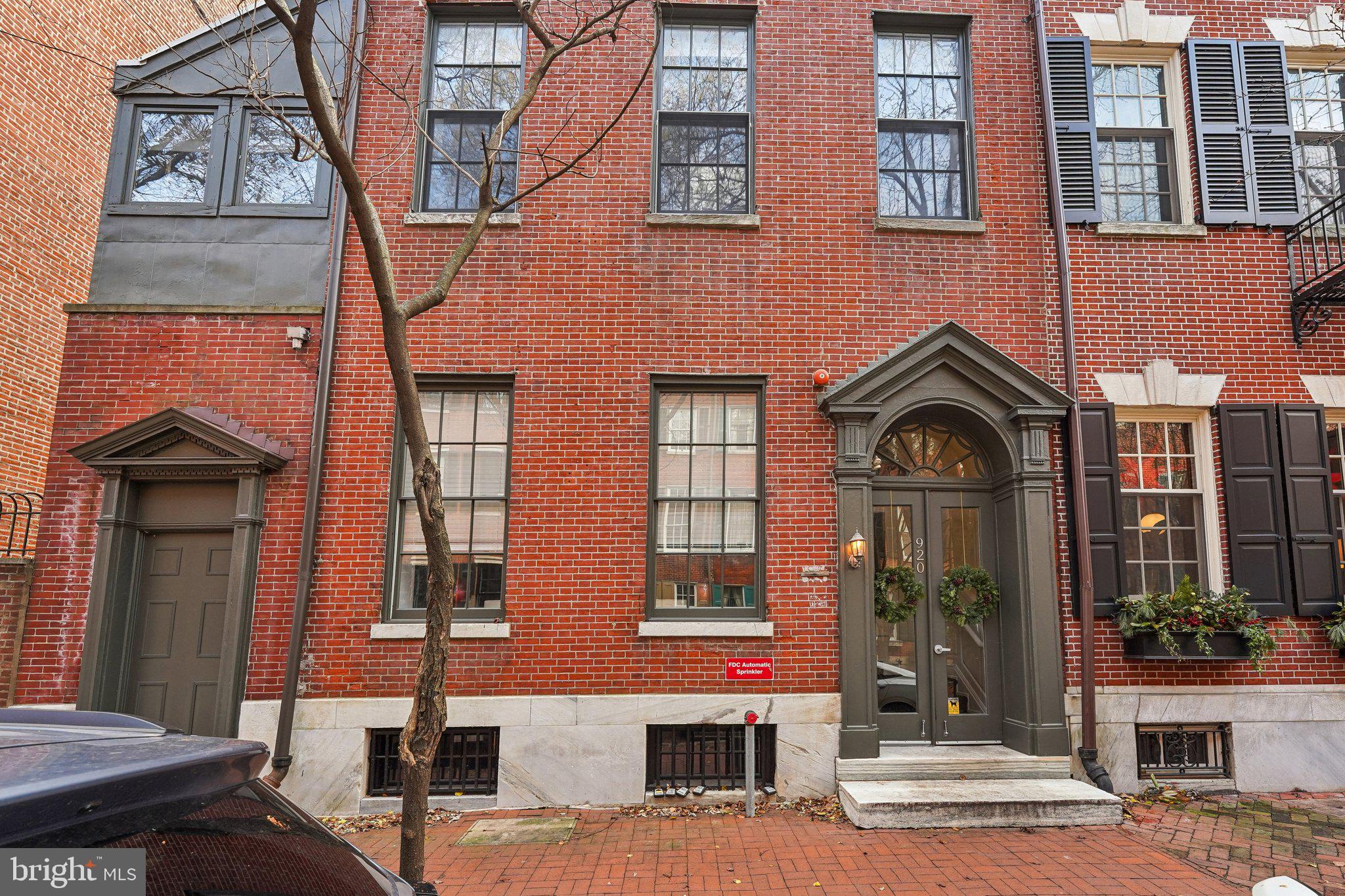 920 Clinton Street, Unit 3R Philadelphia, PA 19107 - Photo 2 of 24 a front view of a building with glass windows
