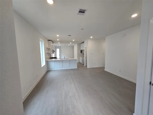 a picture of a living room with furniture