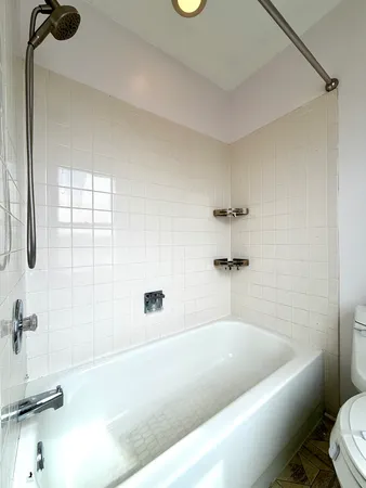 a bathroom with a bathtub
