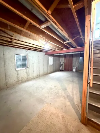 a utility room with a sink a washer and dryer
