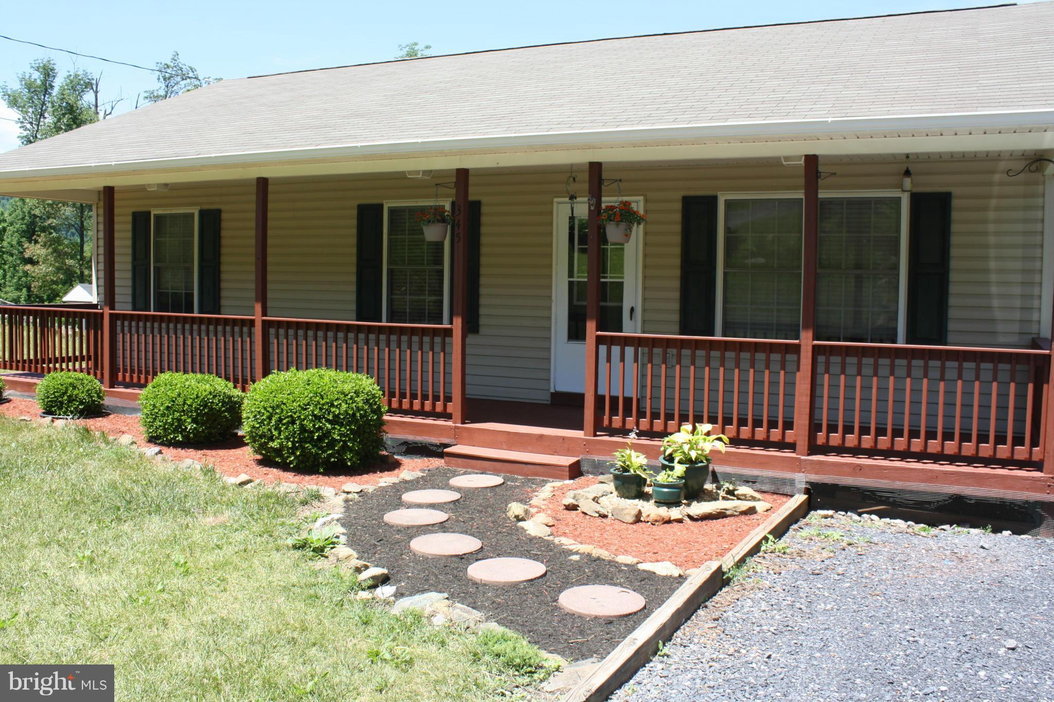 345 Mcdonalds Farm Road Linden, VA 22642 - Photo 2 of 29 a view of a chair in the patio