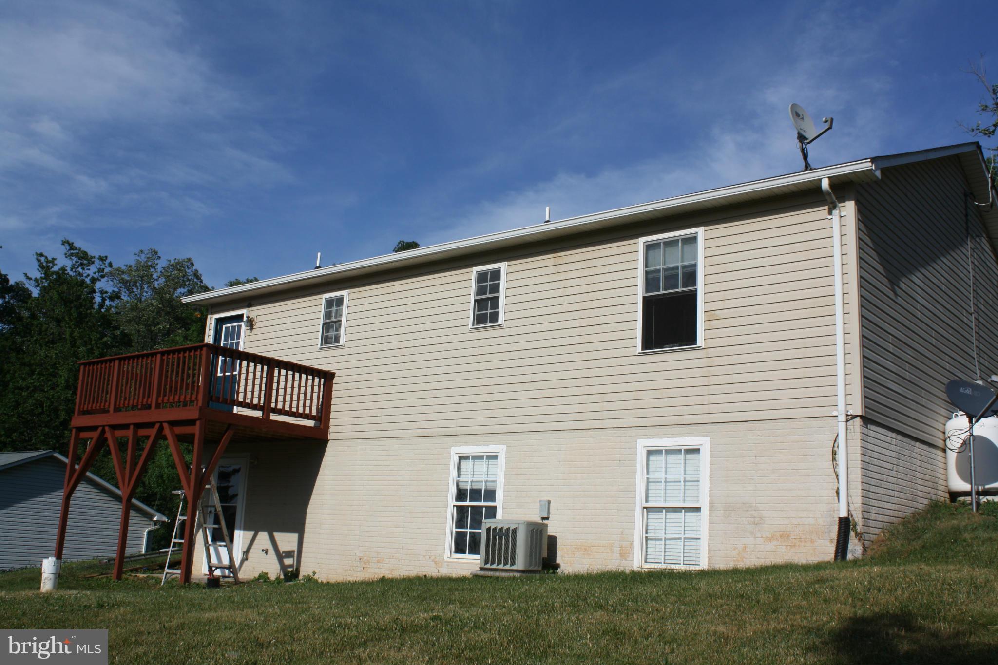 345 Mcdonalds Farm Road Linden, VA 22642 - Photo 4 of 29 a view of house with yard