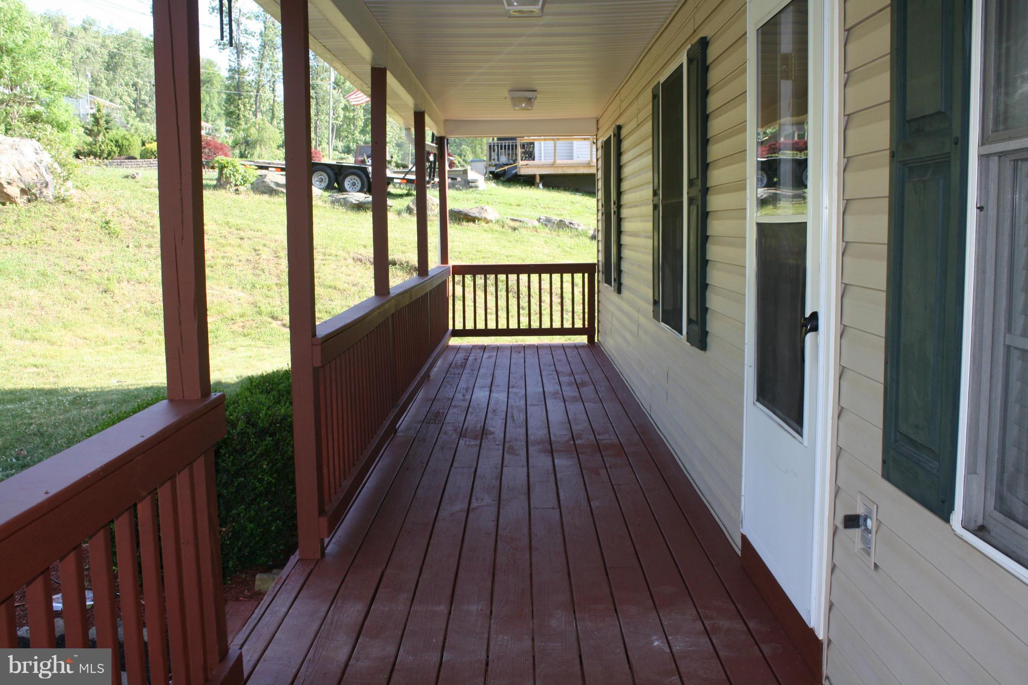 345 Mcdonalds Farm Road Linden, VA 22642 - Photo 7 of 29 a view of balcony with wooden floor