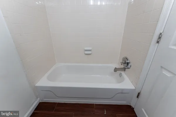 a bathroom with a bathtub