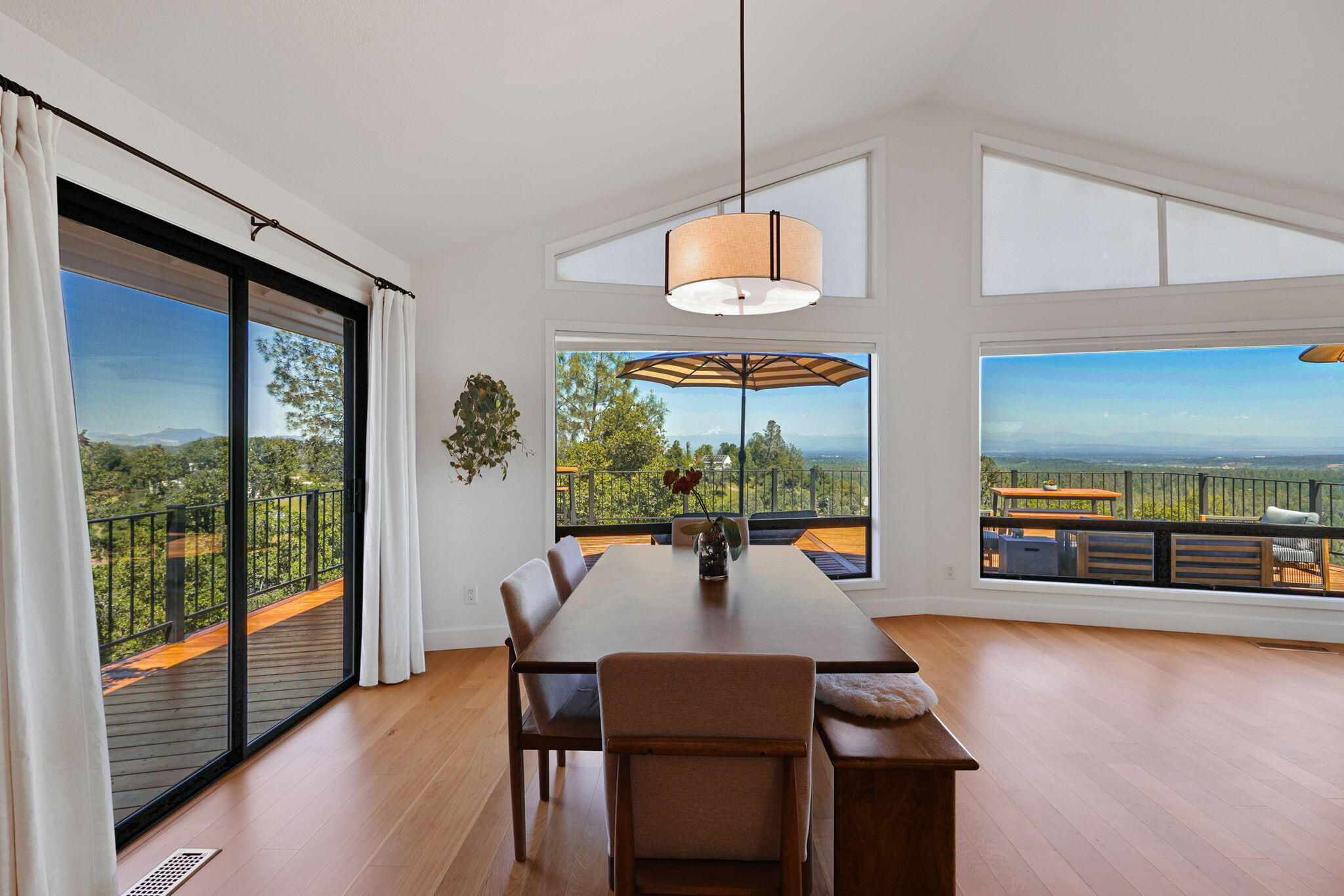 8454 Crown Way Redding, CA 96001 - Photo 11 of 44 a view of a dining room with furniture window and outside view
