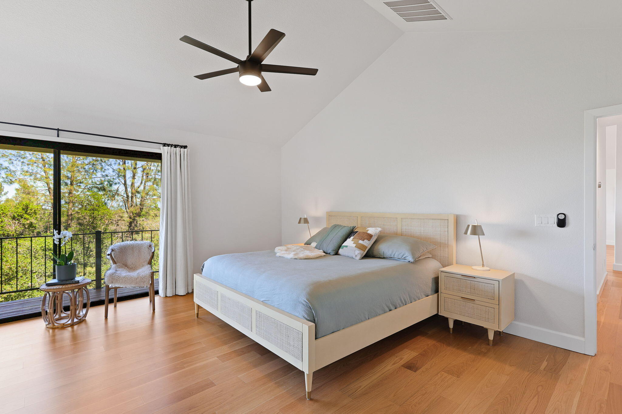 8454 Crown Way Redding, CA 96001 - Photo 13 of 44 a bedroom with a bed and a large window