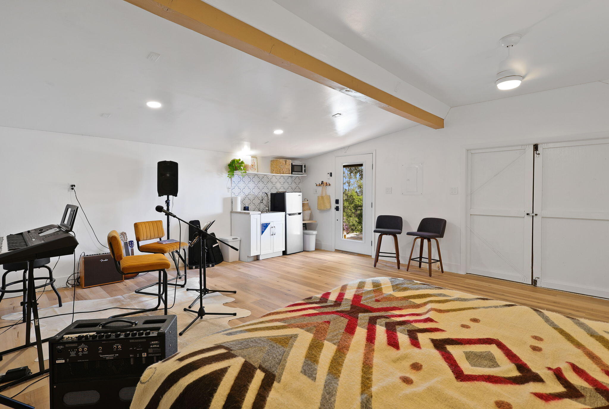 8454 Crown Way Redding, CA 96001 - Photo 26 of 44 a bedroom with a bed and a chandelier