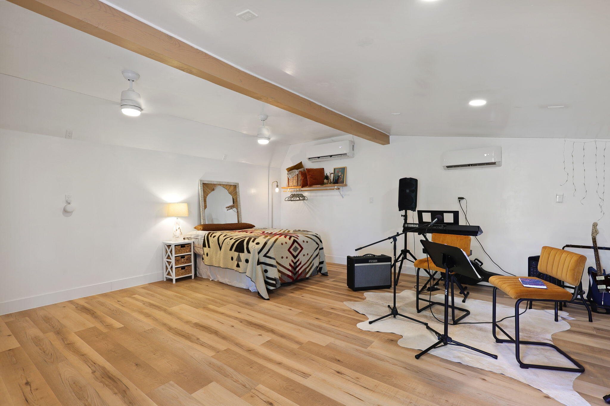 8454 Crown Way Redding, CA 96001 - Photo 28 of 44 a bedroom with a bed and wooden floor