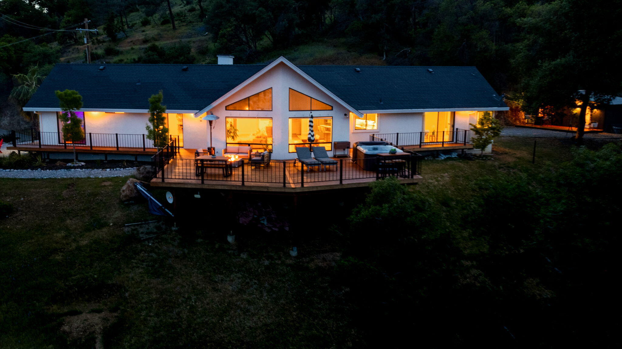 8454 Crown Way Redding, CA 96001 - Photo 29 of 44 a view of a house with backyard porch and sitting area