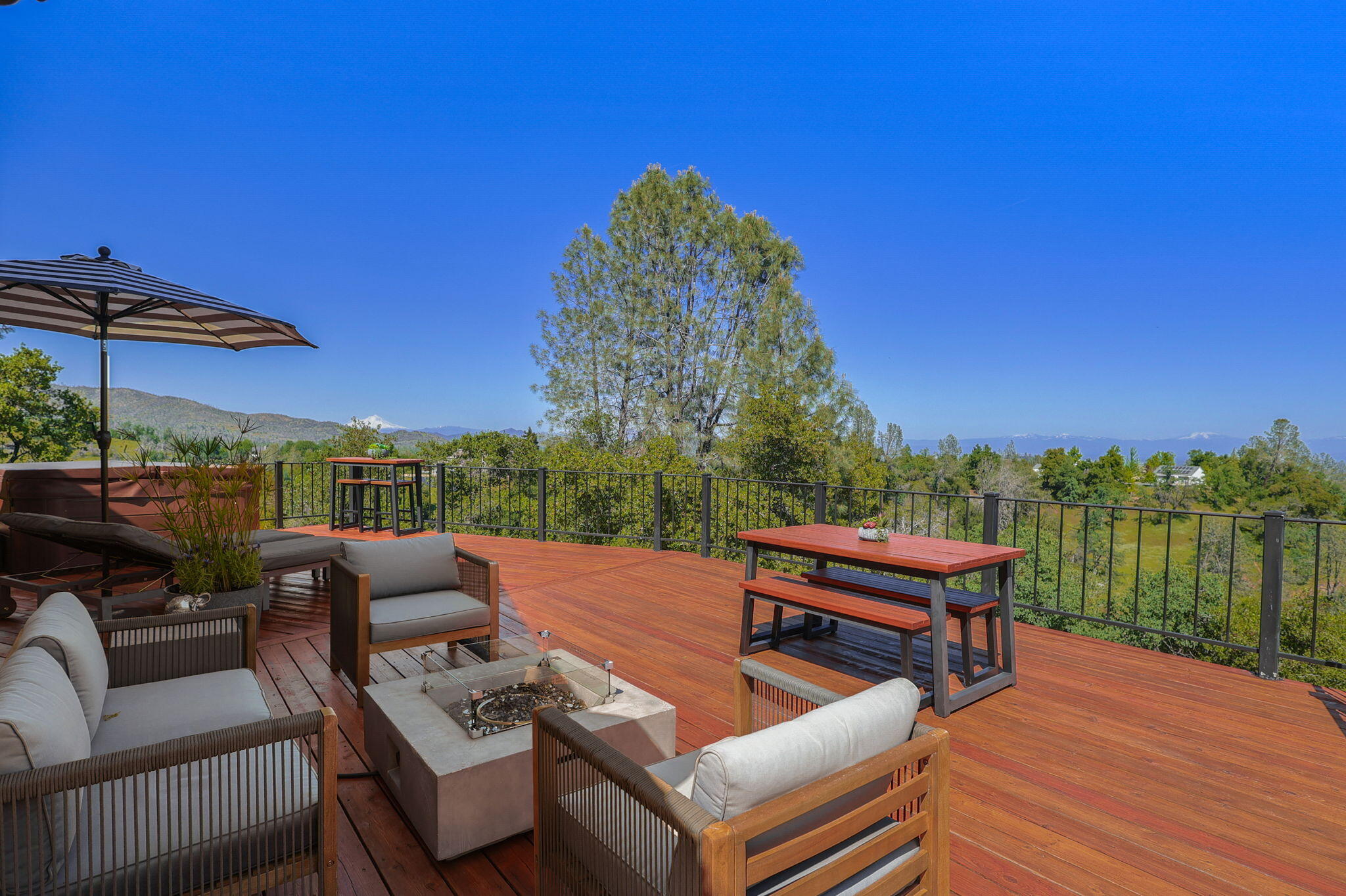 8454 Crown Way Redding, CA 96001 - Photo 32 of 44 a view of a terrace with couches and pool