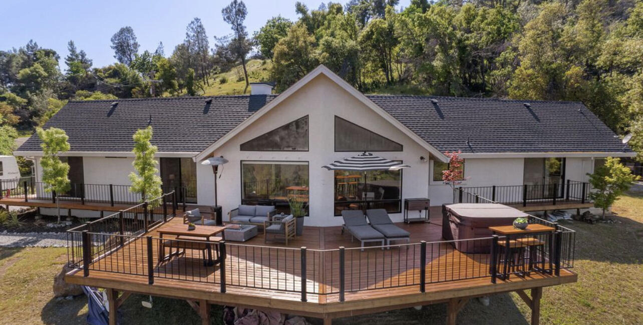 8454 Crown Way Redding, CA 96001 - Photo 39 of 44 a view of a house with patio outdoor seating
