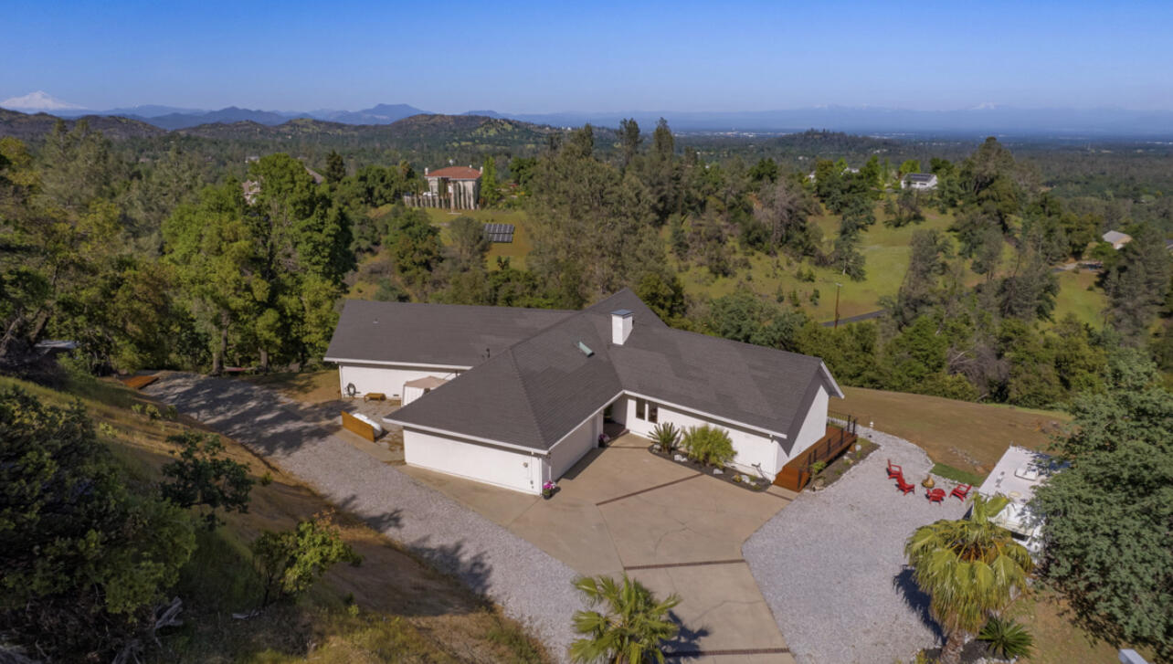 8454 Crown Way Redding, CA 96001 - Photo 42 of 44 an aerial view of a house with mountain view
