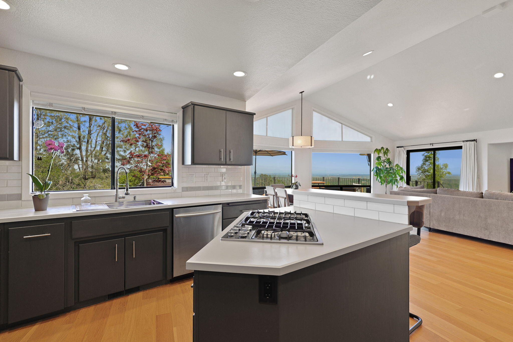 8454 Crown Way Redding, CA 96001 - Photo 9 of 44 a kitchen with stainless steel appliances granite countertop a sink stove and refrigerator