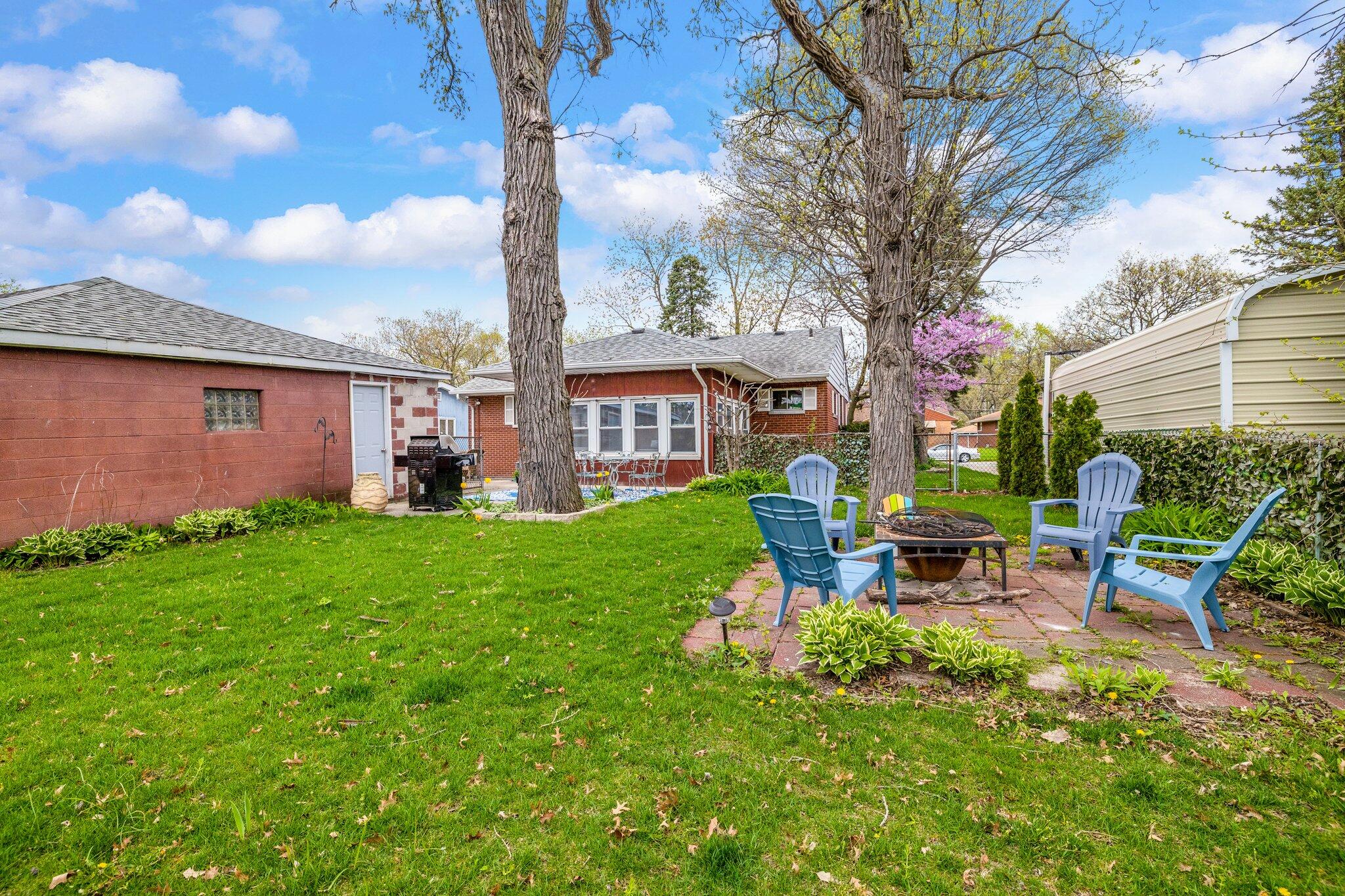 216 Southmoor Road Hammond, IN 46324 - Photo 17 of 19 a view of a house with backyard porch and sitting area