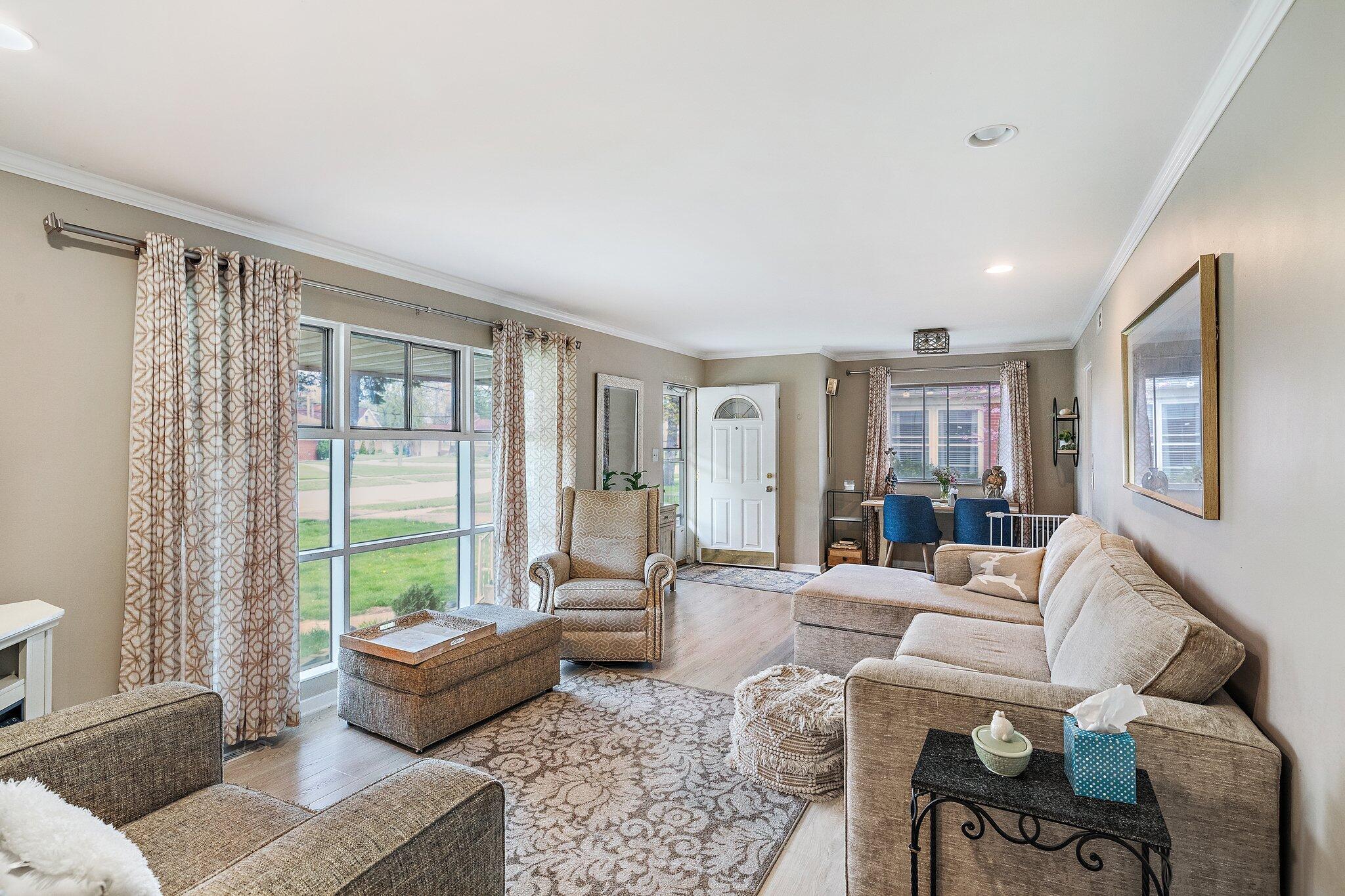 216 Southmoor Road Hammond, IN 46324 - Photo 2 of 19 a living room with furniture and a large window
