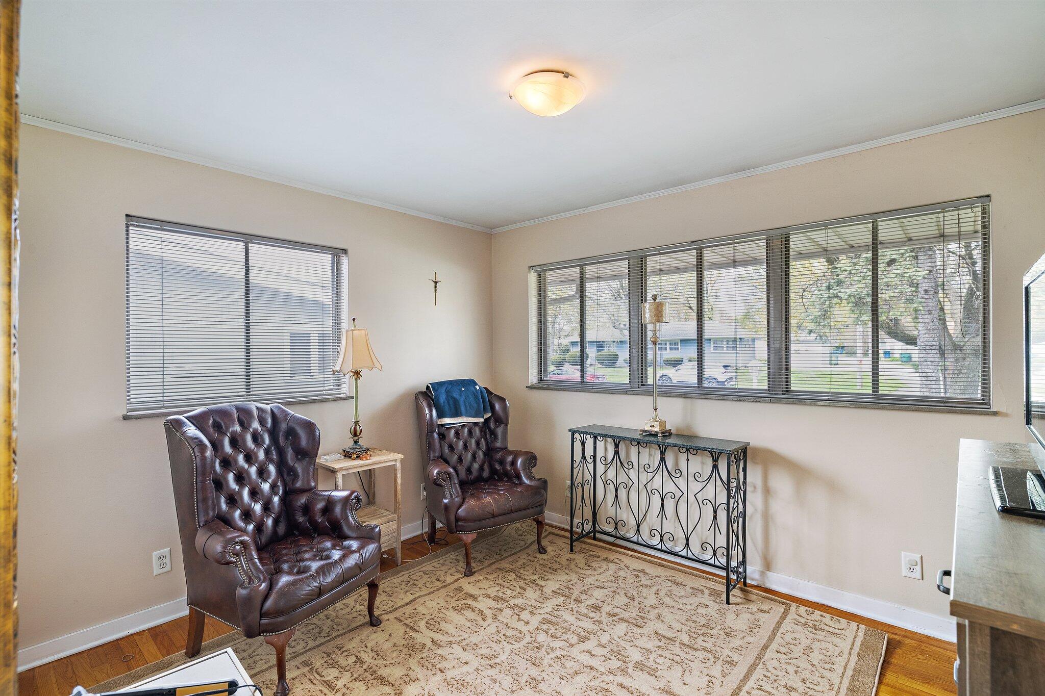216 Southmoor Road Hammond, IN 46324 - Photo 9 of 19 a living room with furniture and a large window