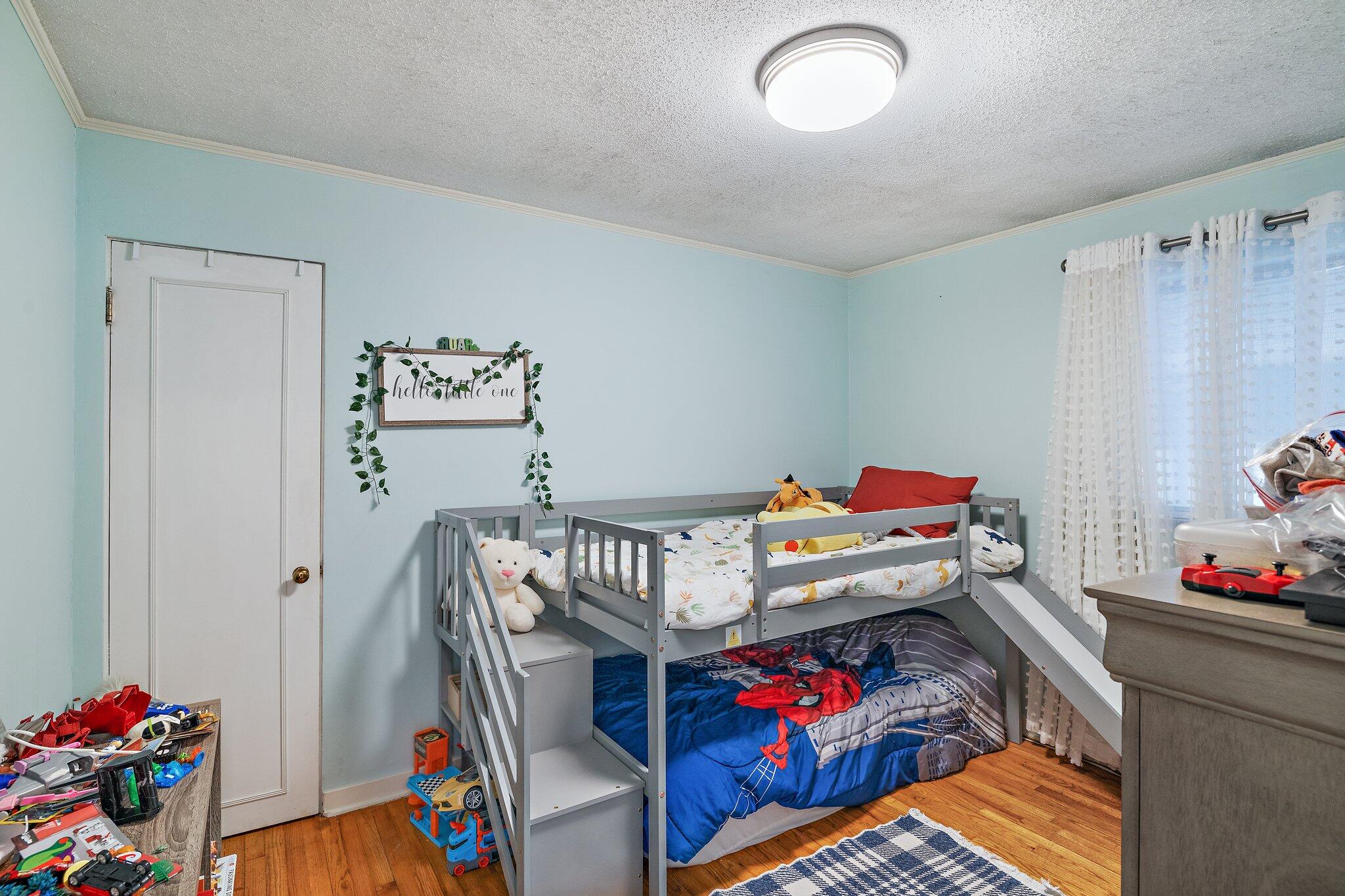 216 Southmoor Road Hammond, IN 46324 - Photo 10 of 19 a bedroom with furniture and toys