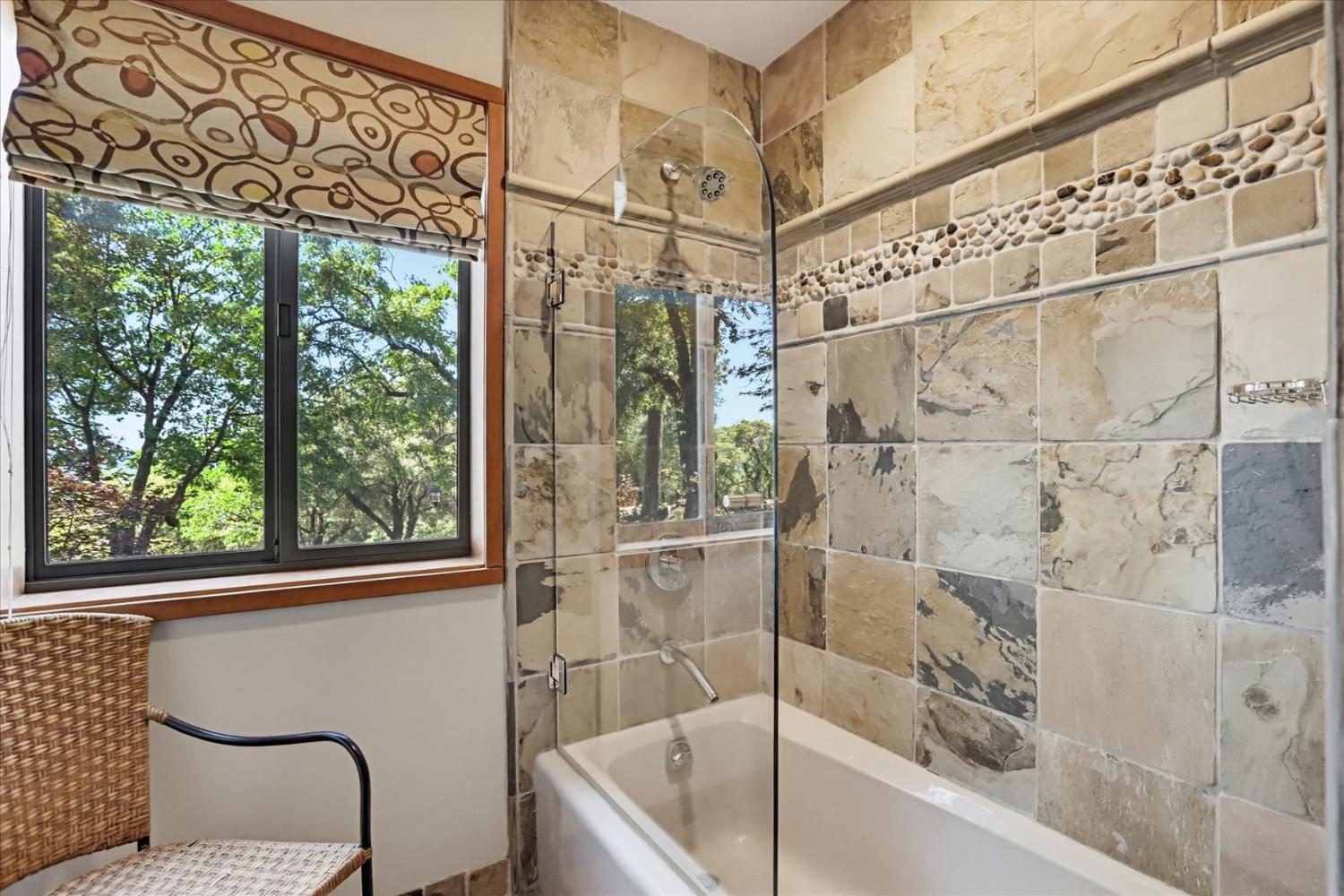 20111 Tanglewood Road Grass Valley, CA 95945 - Photo 32 of 93 a bathroom with a bathtub and shower