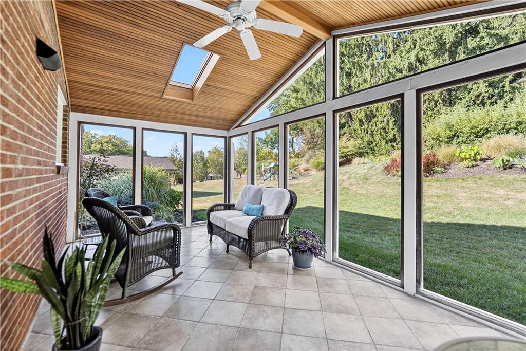 8439 Edwood Road Pittsburgh, PA 15237 - Photo 20 of 46 Screened In Porch with Ceiling Fan and Skylights
