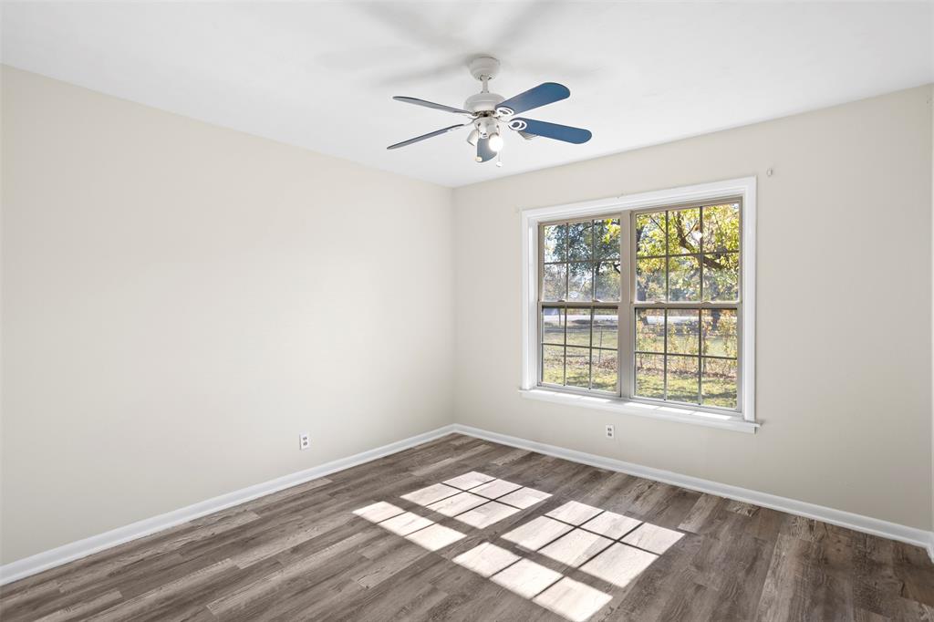 203 Main Street Red Oak, TX 75154 - Photo 18 of 32 a view of an empty room with a window