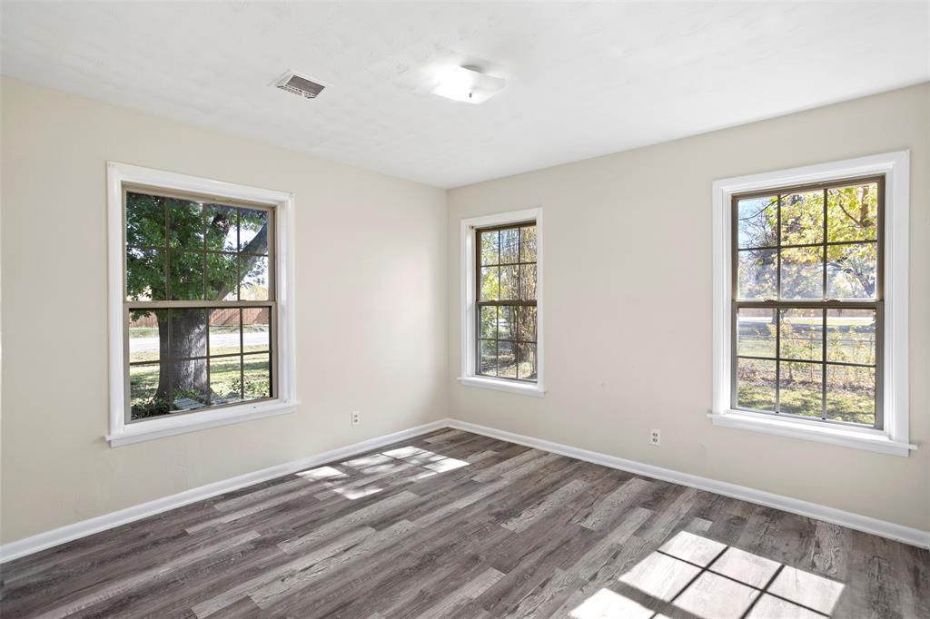 203 Main Street Red Oak, TX 75154 - Photo 19 of 32 a view of empty room with windows