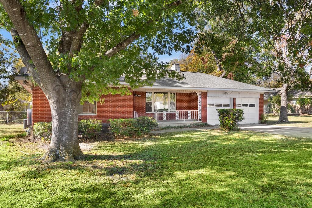 203 Main Street Red Oak, TX 75154 - Photo 2 of 32 a front view of house with yard and green space