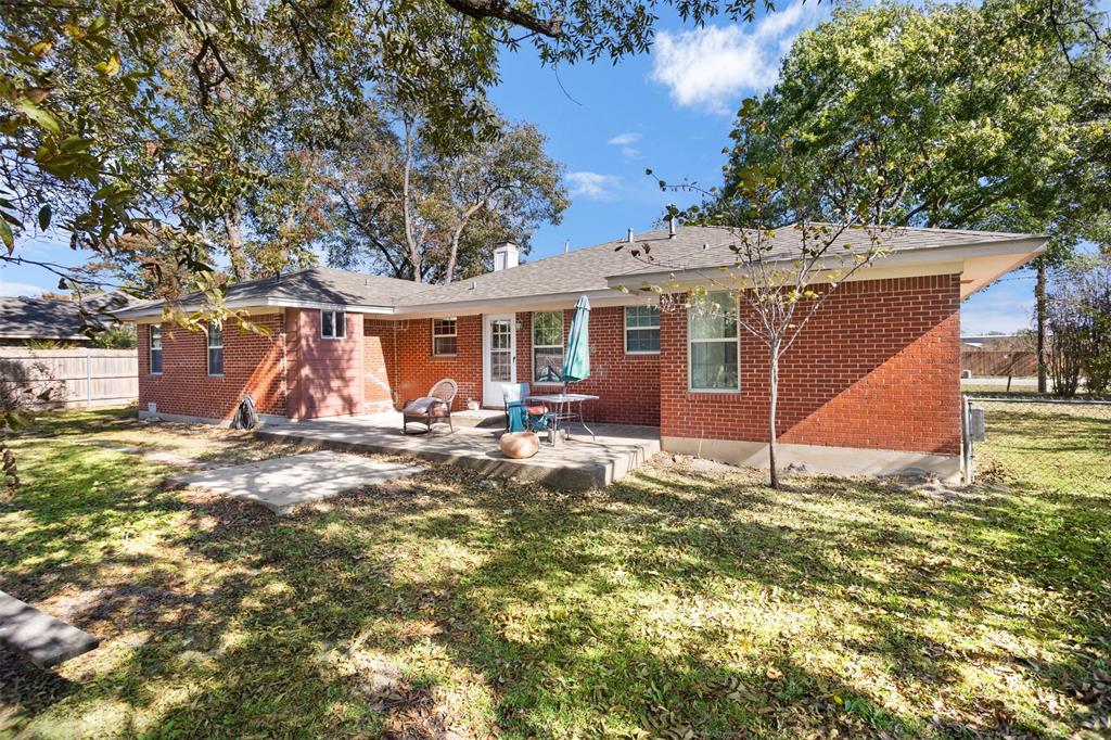 203 Main Street Red Oak, TX 75154 - Photo 25 of 32 a view of a house with a yard