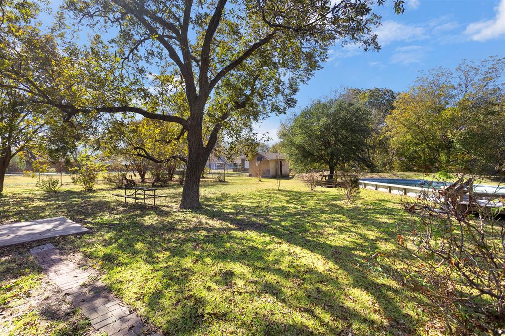 203 Main Street Red Oak, TX 75154 - Photo 26 of 32 a view of yard with trees