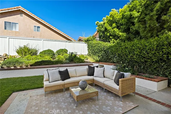 a outdoor living space with furniture and garden