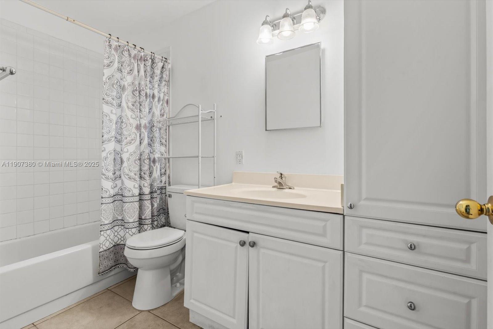3502 Waterview Circle Palm Springs, FL 33461 - Photo 25 of 39 a bathroom with a sink toilet and shower