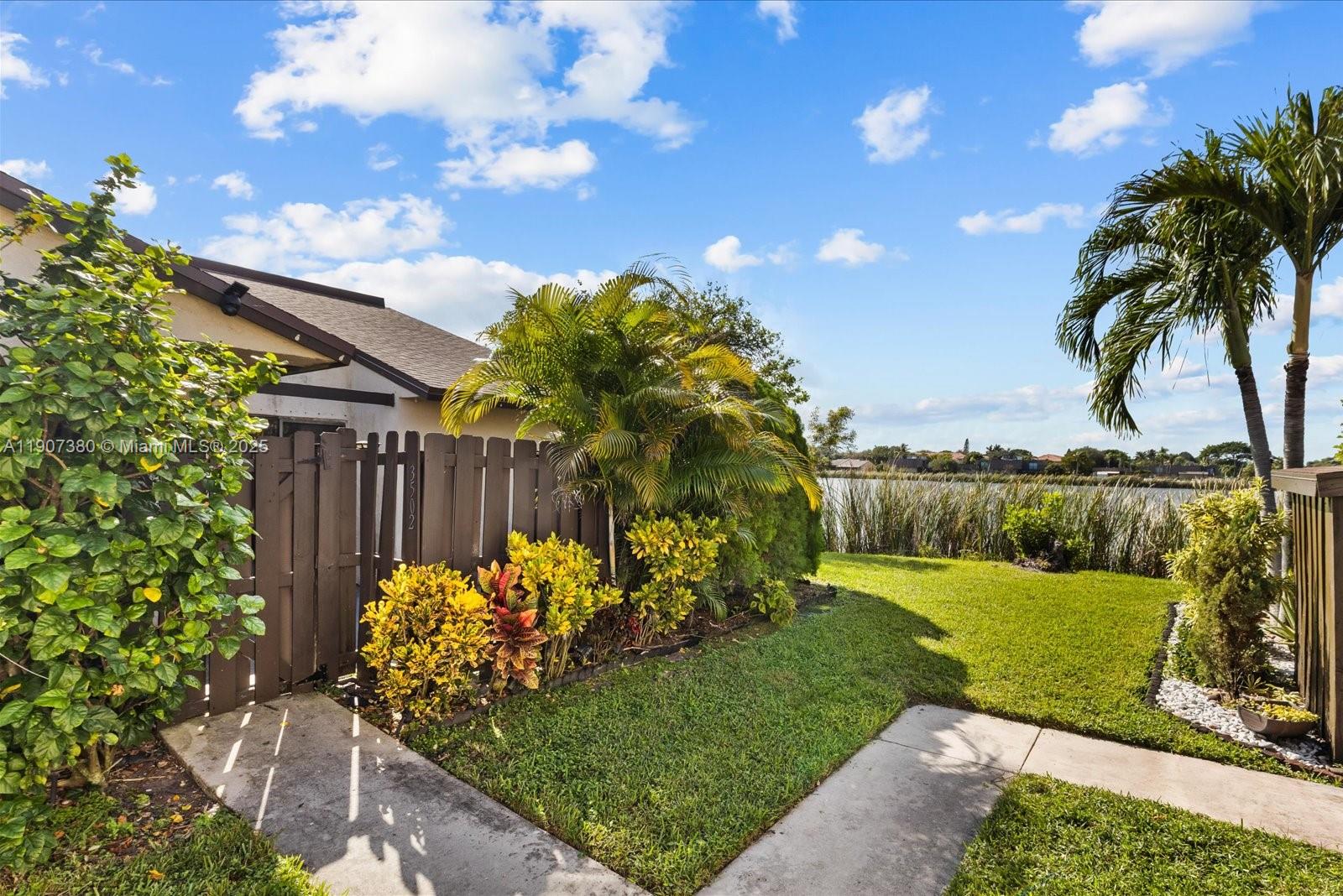 3502 Waterview Circle Palm Springs, FL 33461 - Photo 27 of 39 a view of a garden with a flower in a garden