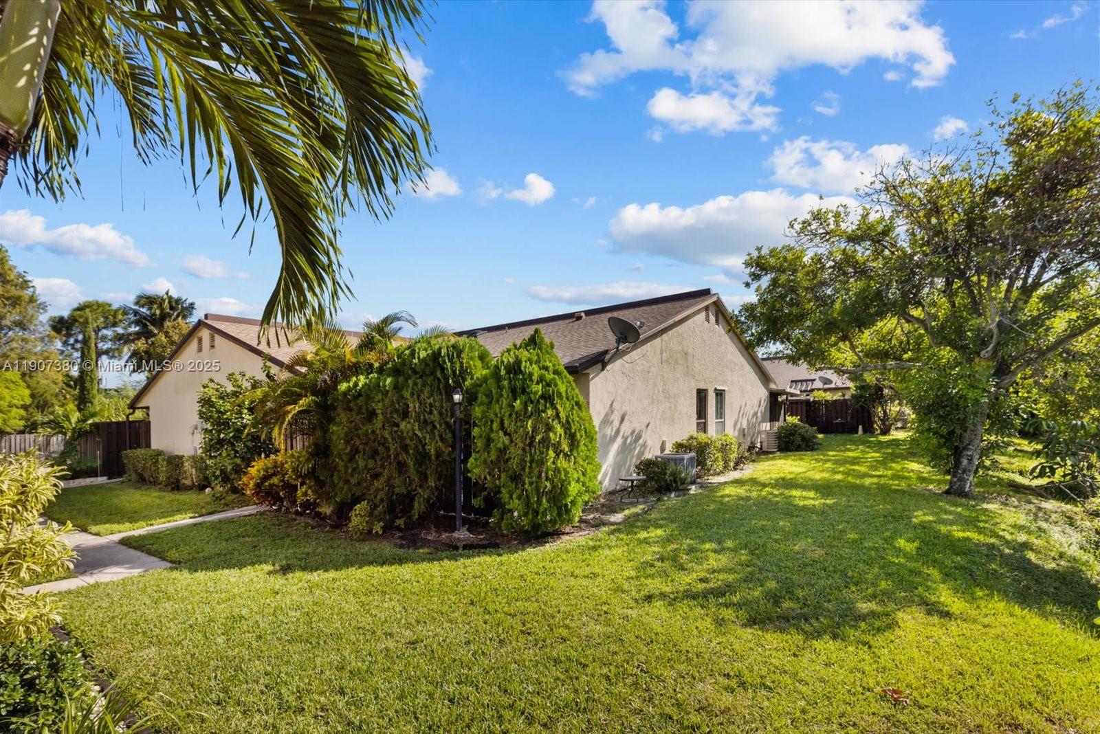 3502 Waterview Circle Palm Springs, FL 33461 - Photo 29 of 39 a view of a house with a yard