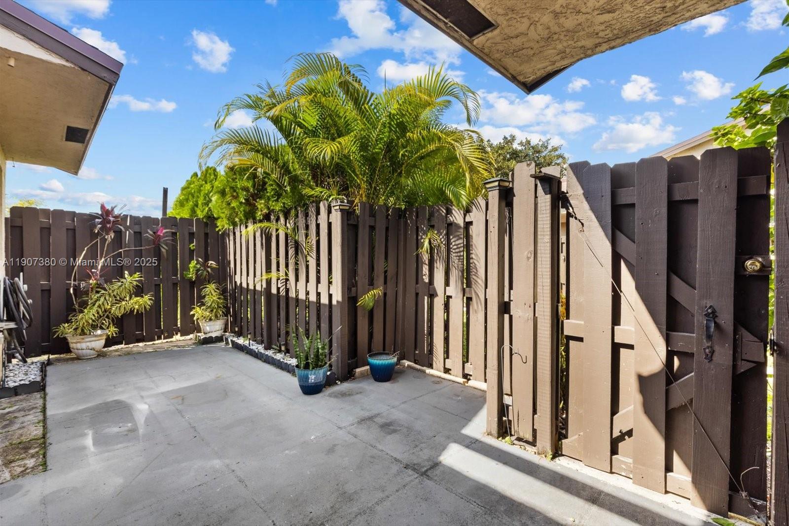 3502 Waterview Circle Palm Springs, FL 33461 - Photo 3 of 39 a view of outdoor space and porch