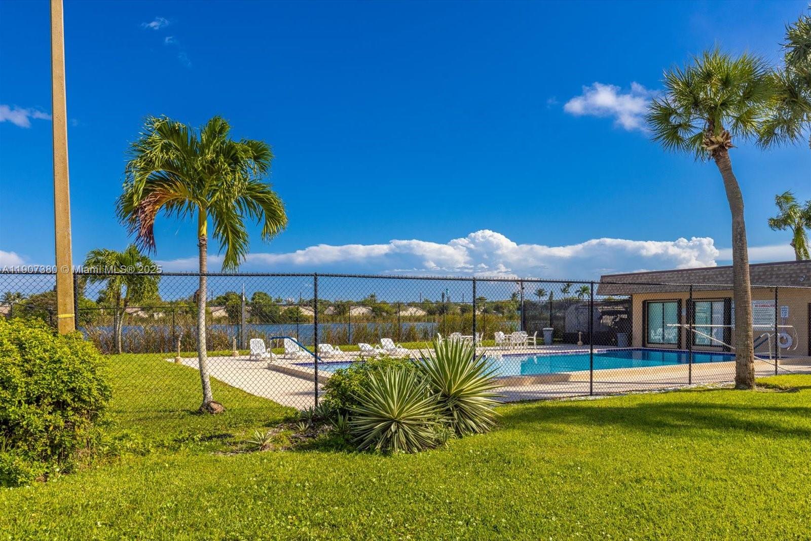 3502 Waterview Circle Palm Springs, FL 33461 - Photo 35 of 39 a house view with a garden space