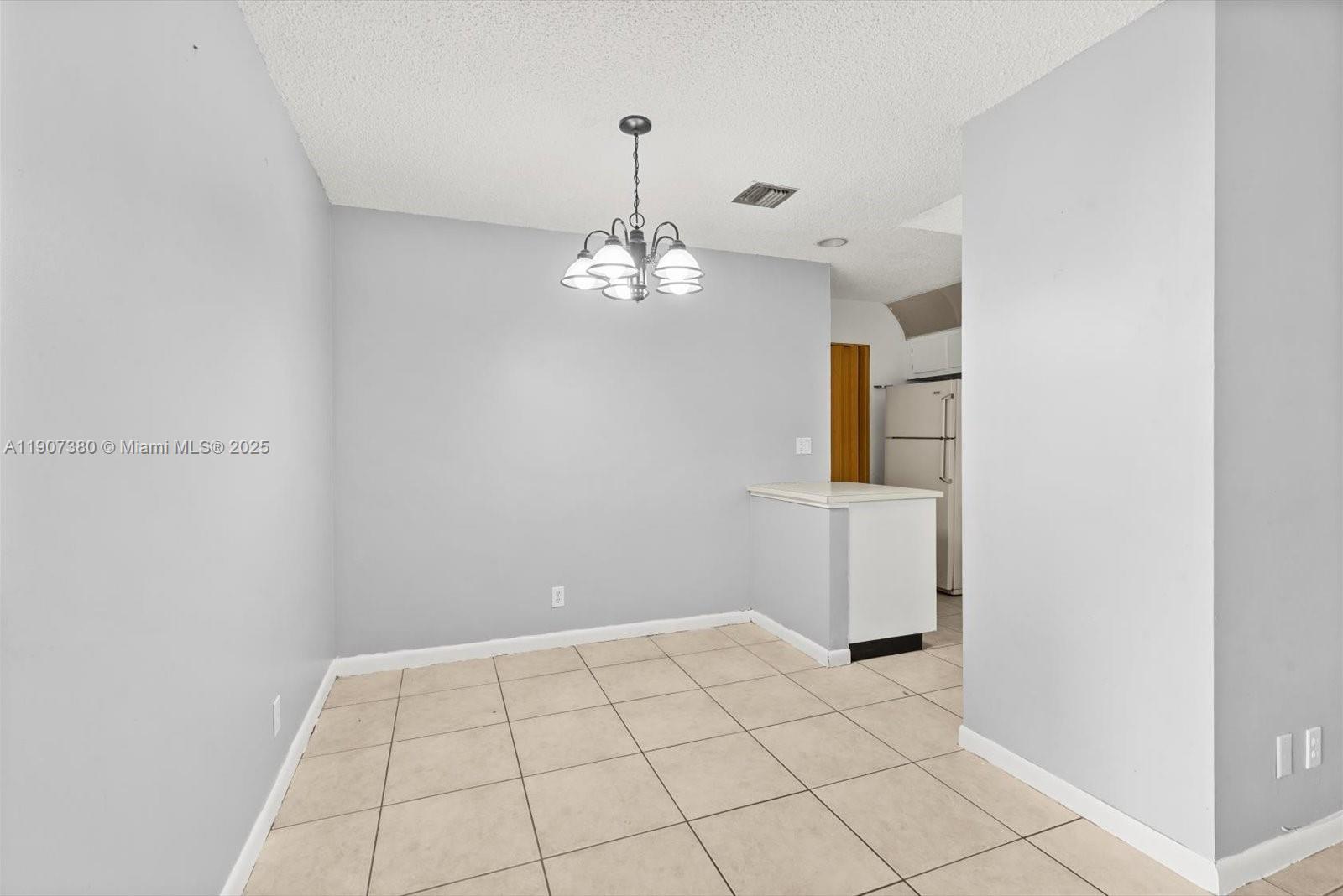 3502 Waterview Circle Palm Springs, FL 33461 - Photo 10 of 39 a view of an empty room