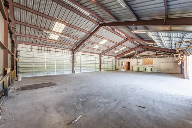 a view of a room with wooden walls