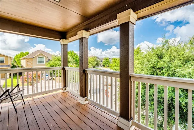 a view of a glass door with a balcony