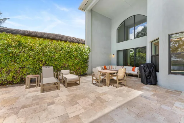 a view of a swimming pool with a patio