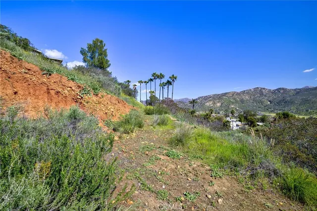 a view of a house with a big yard