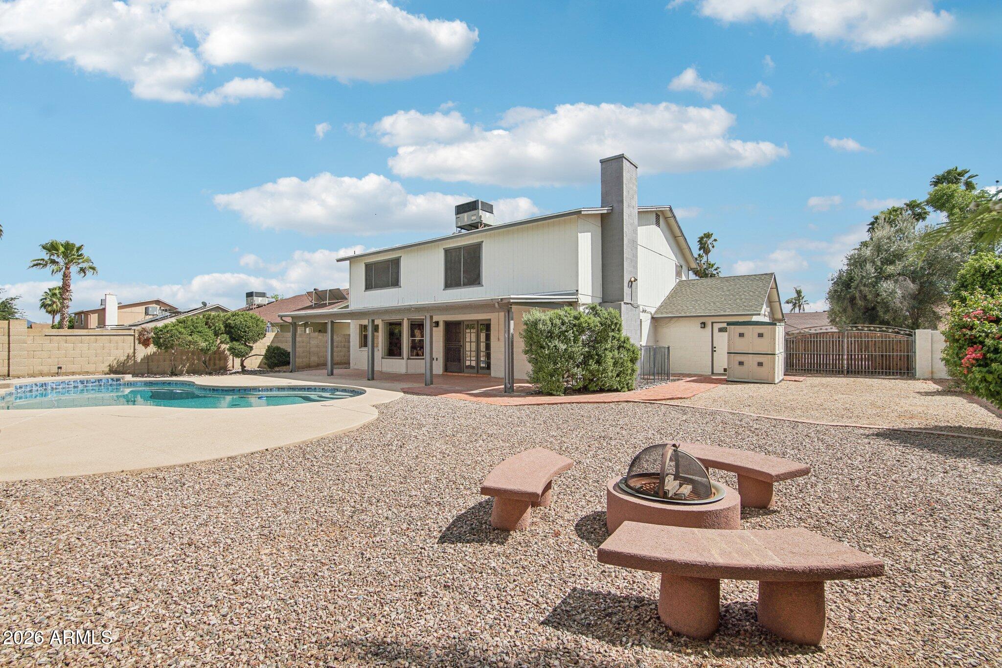 4662 East Grandview Road Phoenix, AZ 85032 - Photo 37 of 42 a front view of a house with sitting area
