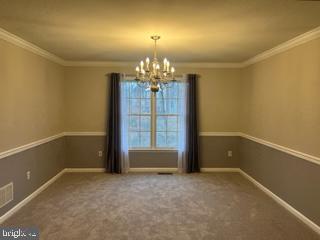 3530 Rippling Way Laurel, MD 20724 - Photo 13 of 59 Formal dining room with chair rail & crown molding