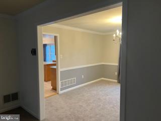 3530 Rippling Way Laurel, MD 20724 - Photo 15 of 59 Formal dining room connects to the kitchen
