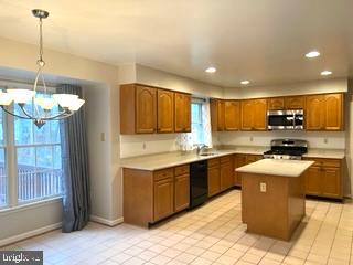 3530 Rippling Way Laurel, MD 20724 - Photo 18 of 59 Kitchen with corian countertop & maple cabinets