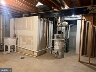 3530 Rippling Way Laurel, MD 20724 - Photo 42 of 59 Furnace in storage room with utility sink