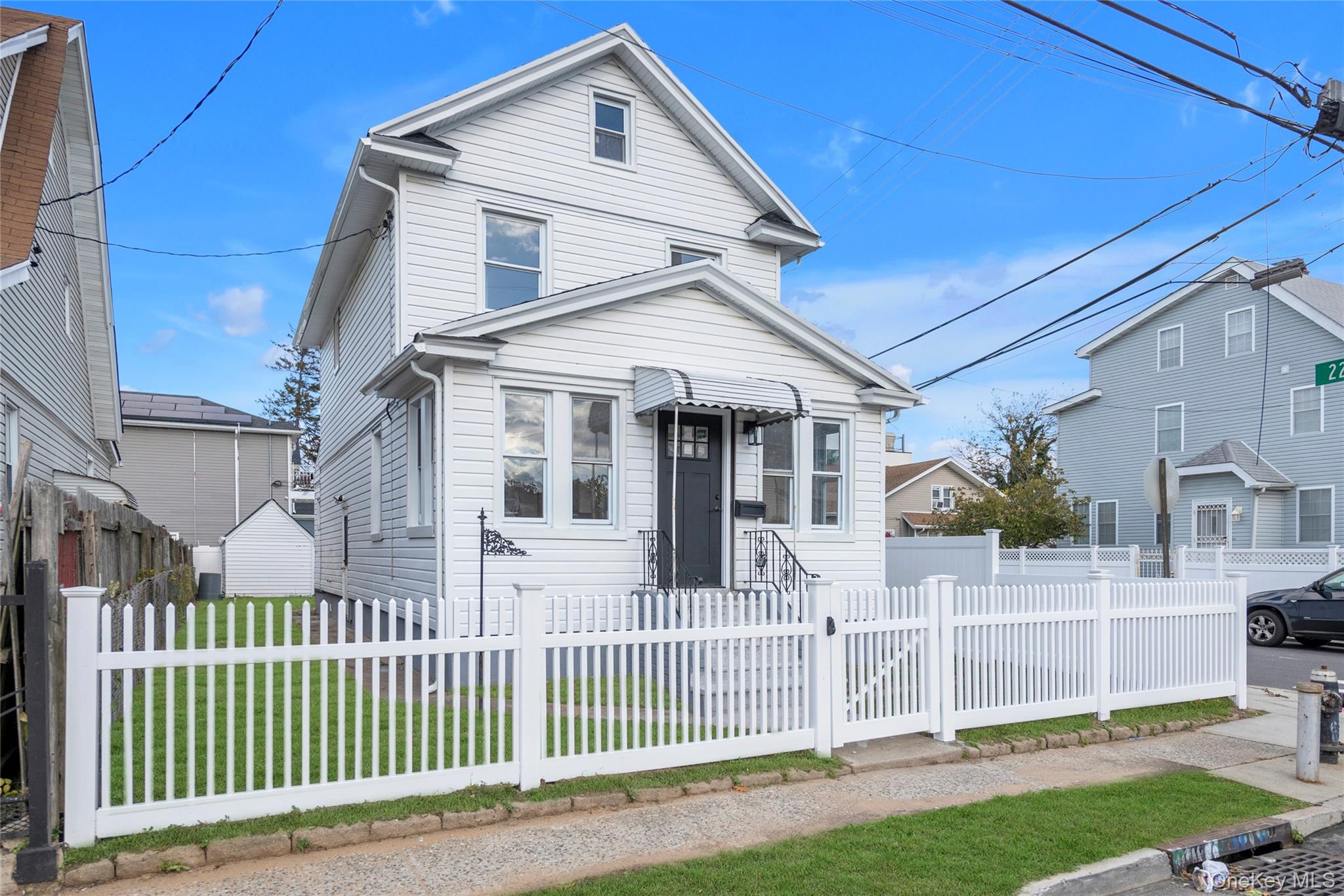 220-27 134th Road Queens, NY 11413 - Photo 22 of 22 Traditional-style home featuring a fenced front yard