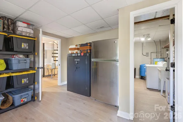 a kitchen with stainless steel appliances a refrigerator and a stove