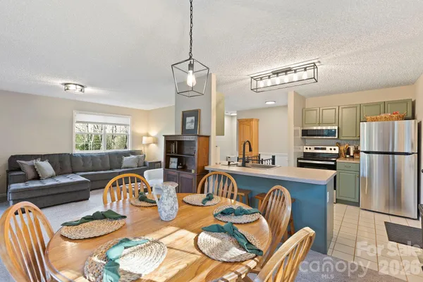 a view of a dining room with furniture