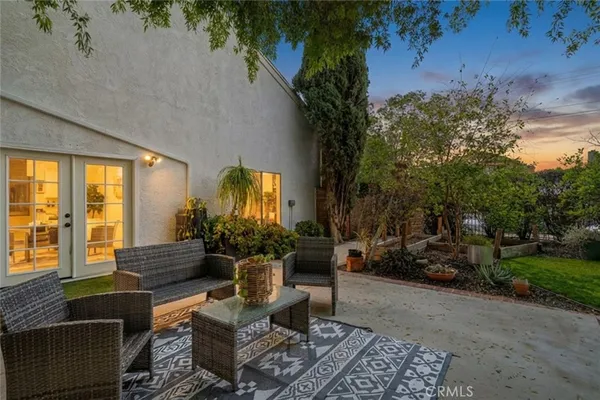 a building outdoor space with patio furniture